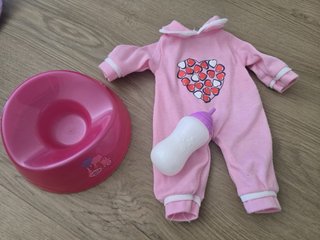 Muñeco Baby Born con silla