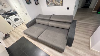 Sofá gris de tela