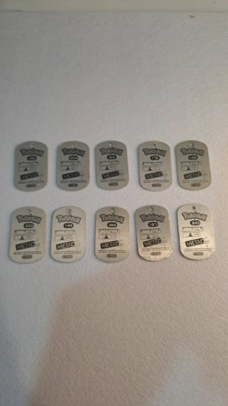 Lote 10 metal tags  Pokémon