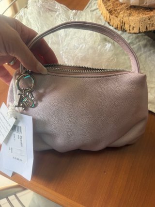 Pochette rosa nuova con cartellino