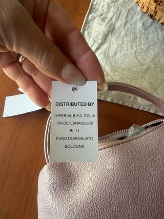 Pochette rosa nuova con cartellino