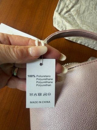 Pochette rosa nuova con cartellino
