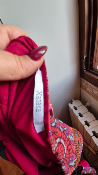 Abito fantasia cerchi nero e fucsia