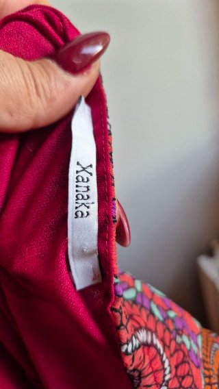 Abito fantasia cerchi nero e fucsia