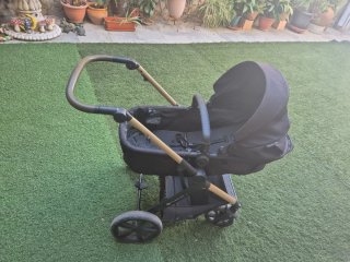 Carro de bebé negro  y silla a la vez