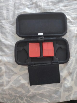 Funda Oficial Nintendo Switch + Cajas Cartuchos