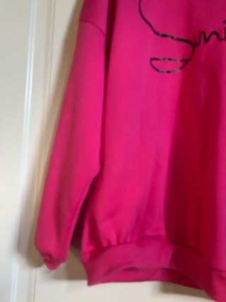 Felpa over fucsia con scritta Smile