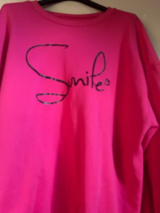 Felpa over fucsia con scritta Smile