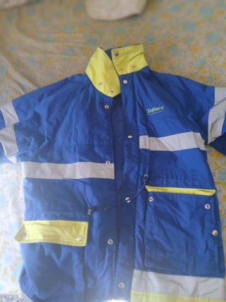 Chaqueta y chubasquero Telefónica
