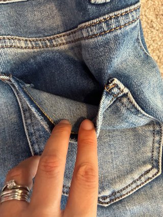 Jeans elasticizzati con strass TG M