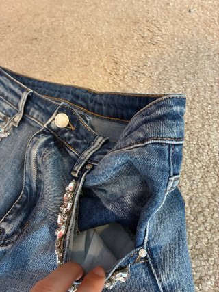 Jeans elasticizzati con strass TG M