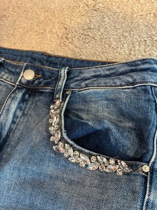 Jeans elasticizzati con strass TG M