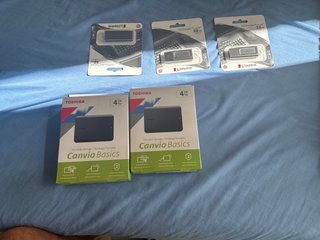 2 Discos Duros 4TB y 3 USB 32GB