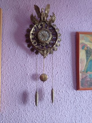 Reloj de pared antiguo águila con péndulo