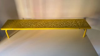 Estante de mesa amarillo metálico