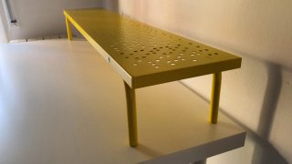 Estante de mesa amarillo metálico