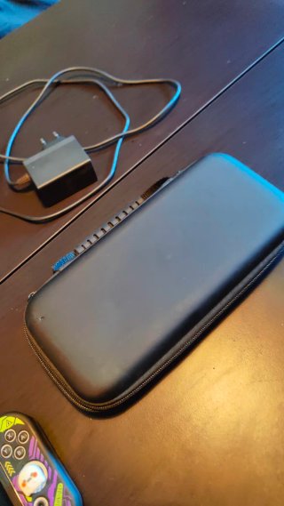 Nintendo Switch OLED + custodia + accessori