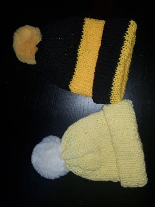 Cappelli di lana con pompon