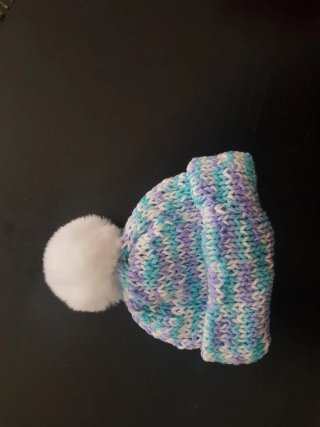 Cappelli di lana con pompon