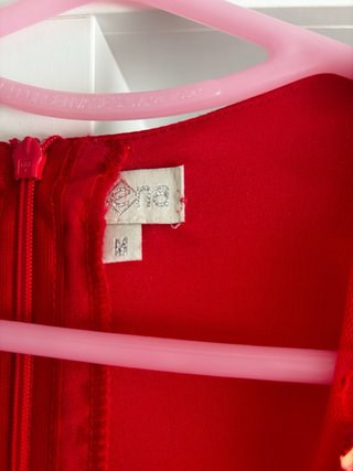 Mono de fiesta rojo con pedrería