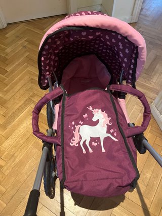 Carrito de juguete rosa