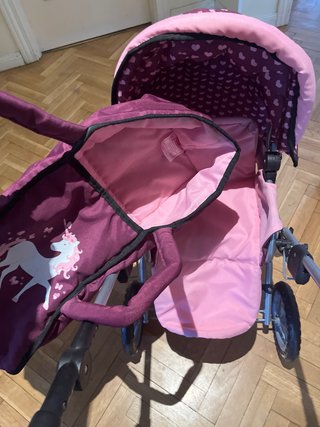 Carrito de juguete rosa