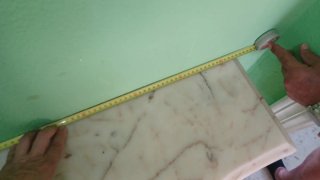 Mesa consola de bronce y mármol