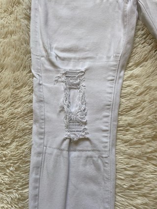 Jeans bianchi strappati Manfinity