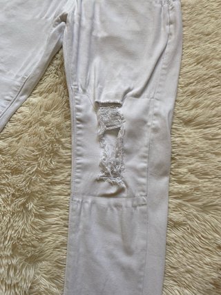 Jeans bianchi strappati Manfinity
