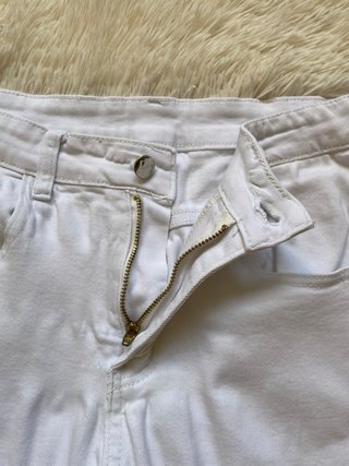 Jeans bianchi strappati Manfinity