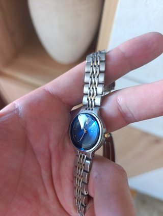 Reloj Yves Saint Laurent azul y plateado