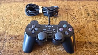 PlayStation 2 Fat Nera + Accessori