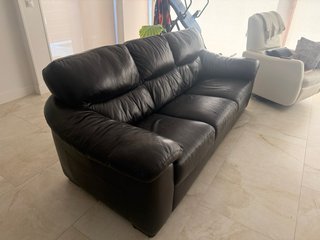 Sofá de piel Natuzzi marrón