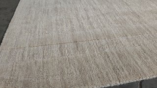 Alfombra Dalena de lana jacquard raya beige 300 x 200 cm.