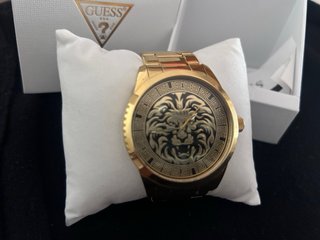 Reloj Guess Dorado con León