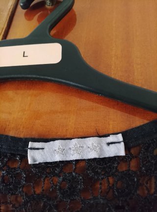 Camiseta sin mangas de encaje negra