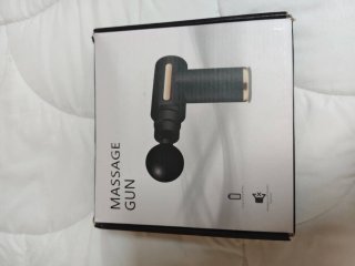Pistola de masaje