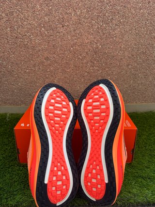 Nike Vomero Plus Naranja y Rosa