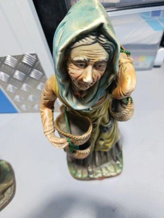 Figura de hombre con cántaros