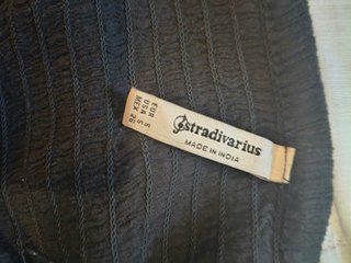 Mono largo negro Stradivarius botones