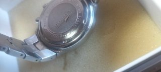 Reloj Lotus plateado funcionando