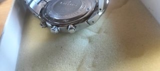 Reloj Lotus plateado funcionando