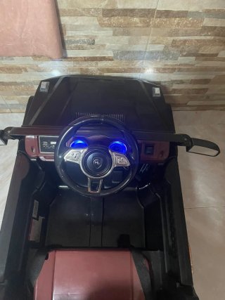 Coche eléctrico infantil negro