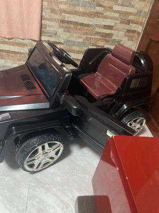 Coche eléctrico infantil negro