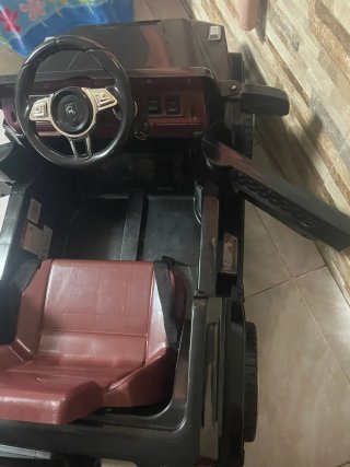 Coche eléctrico infantil negro