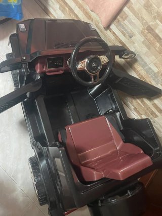 Coche eléctrico infantil negro