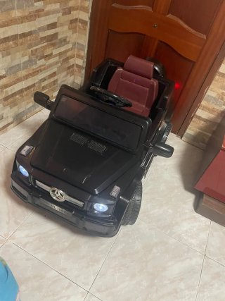 Coche eléctrico infantil negro
