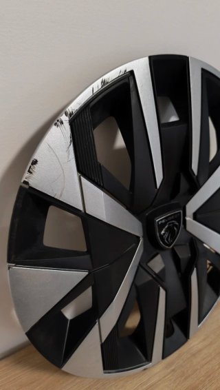 Copricerchio Peugeot "monti" Nero e Argento