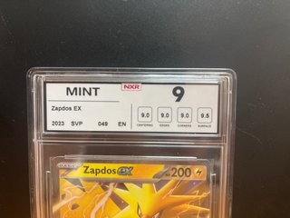 Zapdos EX SVP 049 NXR Graduado 9 MINT