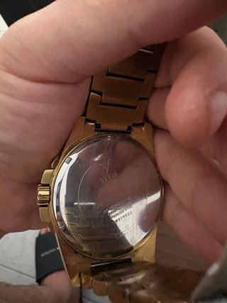 Reloj Guess Dorado con brillantes